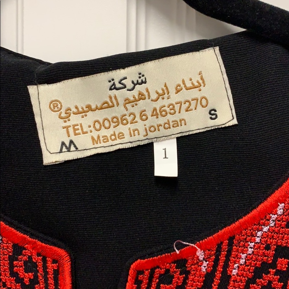 Never worn, bought on vacation
